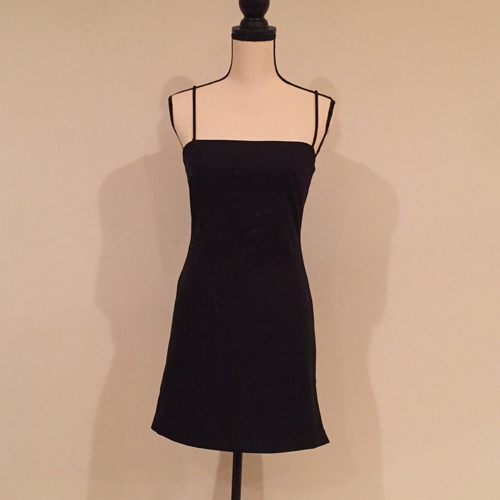 Black spaghetti strapped knee length dress